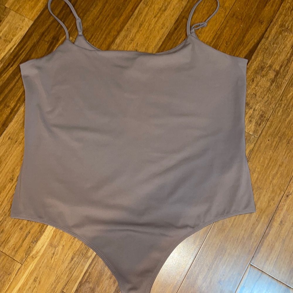 NWT. Express body suite. Size XL